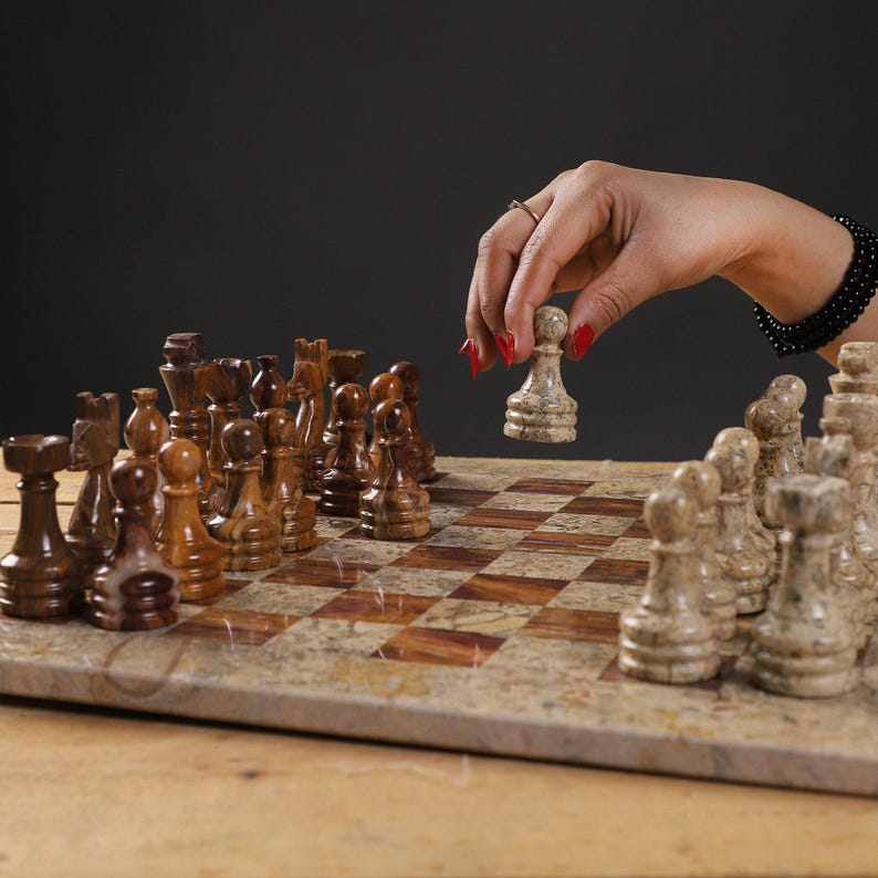 Warm and Inviting: Coral & Brown Marble Chess Set