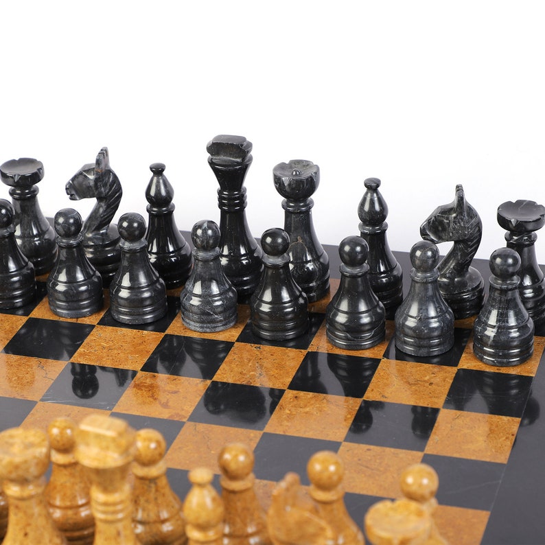 Luxurious Serenity: Black & Golden Marble Chess Set