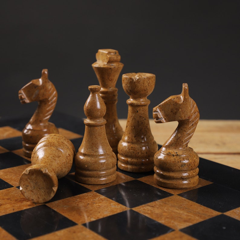 Luxurious Serenity: Black & Golden Marble Chess Set